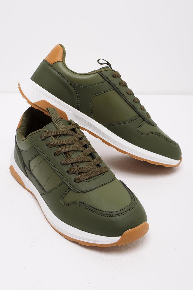 Boys green trainers 2025