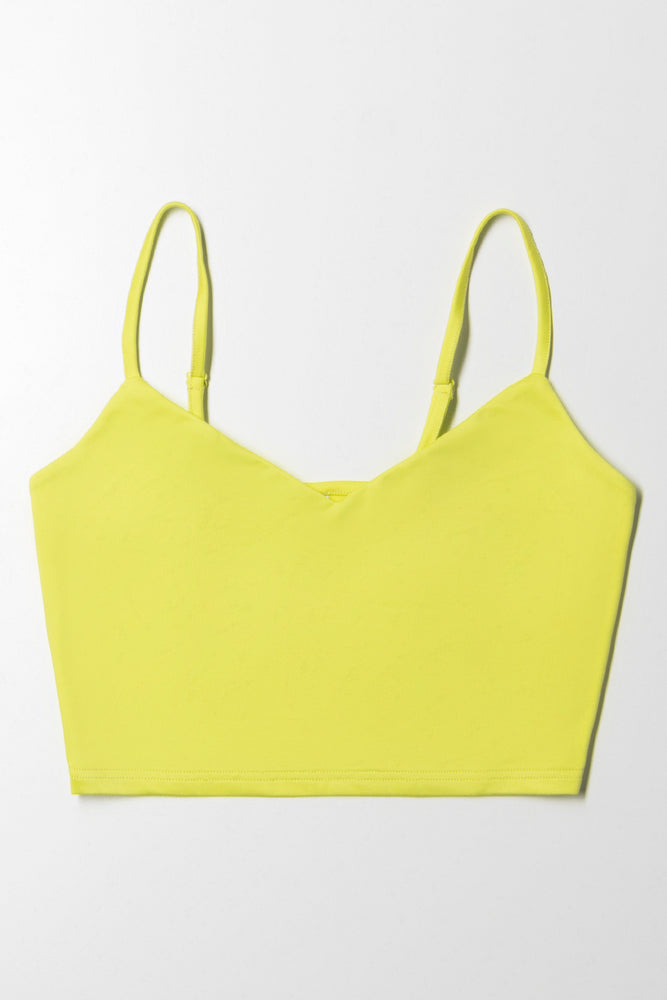 Turn heads with this vibrant lime slinky vest. Crafted from smooth, slinky fabric, it offers a flattering fit and a touch of shine, making it a standout piece for casual or evening looks. Style it with tailored pants or a leather skirt for effortless glam.

Product Information:

-Smooth
-Versatile