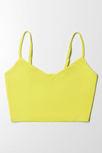Turn heads with this vibrant lime slinky vest. Crafted from smooth, slinky fabric, it offers a flattering fit and a touch of shine, making it a standout piece for casual or evening looks. Style it with tailored pants or a leather skirt for effortless glam.

Product Information:

-Smooth
-Versatile