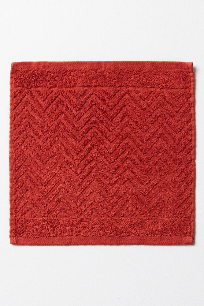 TEXTURED FACE CLOTH CINNABAR